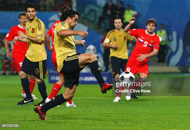 Xavi Hernandez of Spain scores the opening goal during the UEFA EURO 2008 Semi Final match between Russia and Spain at Ernst Happel Stadion on June...