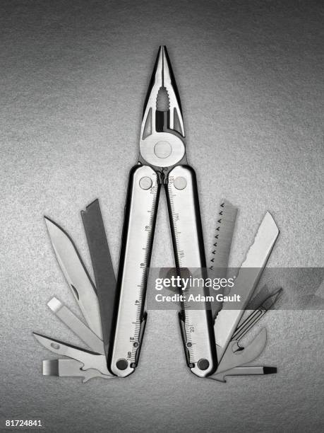 a pair of multifunctional silver pliers - multi purpose stock pictures, royalty-free photos & images