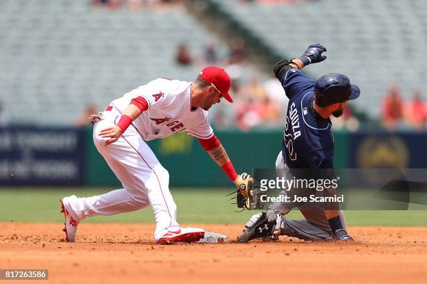 Nick Franklin tags out Steven Souza Jr. At second base in the second inning at Angel Stadium of Anaheim on July 16, 2017 in Anaheim, California.