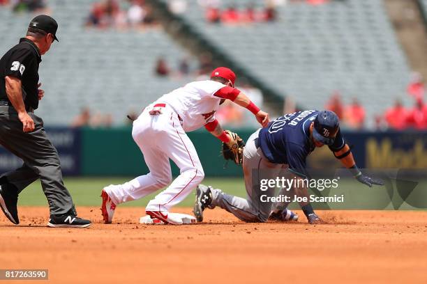 Nick Franklin tags out Steven Souza Jr. At second base in the second inning at Angel Stadium of Anaheim on July 16, 2017 in Anaheim, California.