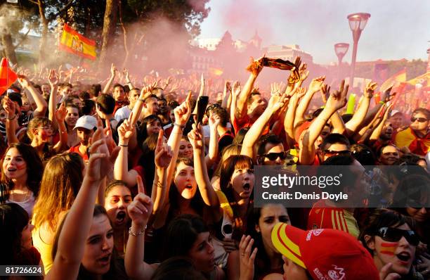 Spanish fans follow their team on a giant tv screen the Euro 2008 semi-final match between Spain and Russia at Plaza Colon on June 26, 2008 in...