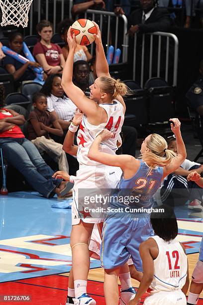 Katie Feenstra of the Atlanta Dream grabs a rebound in front of Brooke Wyckoff of the Chicago Sky during the WNBA game on June 6, 2008 at Philips...