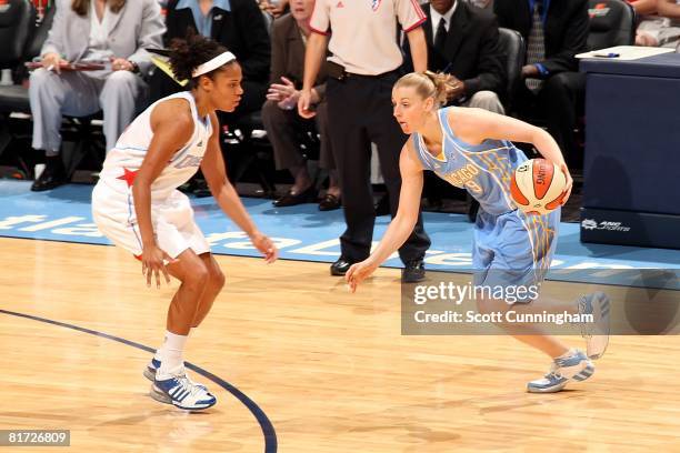 Cathy Joens of the Chicago Sky drives against Chioma Nnamaka of the Atlanta Dream during the WNBA game on June 6, 2008 at Philips Arena in Atlanta,...