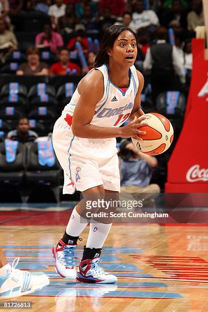 Ivory Latta of the Atlanta Dream looks to pass the ball against the Chicago Sky during the WNBA game on June 6, 2008 at Philips Arena in Atlanta,...