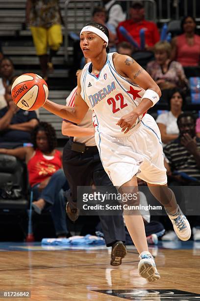 Betty Lennox of the Atlanta Dream pushes the ball upcourt against the Chicago Sky during the WNBA game on June 6, 2008 at Philips Arena in Atlanta,...