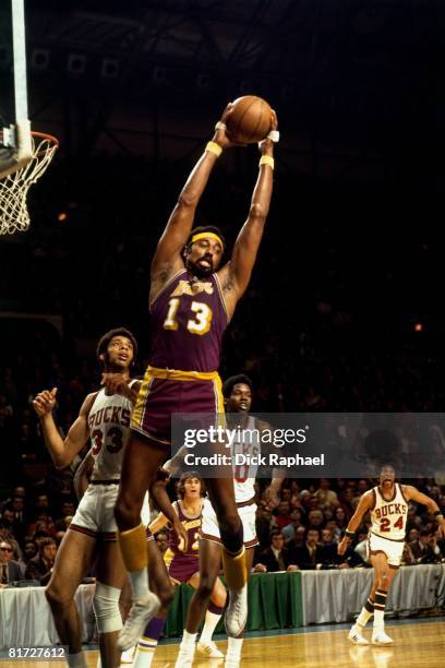 Wilt Chamberlain of the Los Angeles Lakers grabs the rebound against Kareem Abdul-Jabbar of the Milwaukee Bucks circa 1972 at the Bradley Center in...