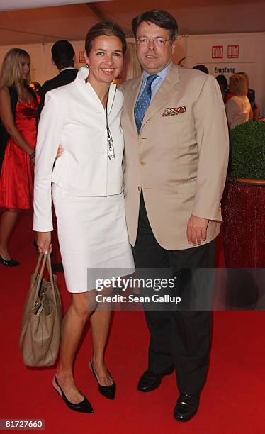 Deutsche Entertainment AG Chairman Peter Schwenkow and his wife Inga Griese-Schwenkow attend the Bild Summer Party on June 26, 2008 in Berlin,...