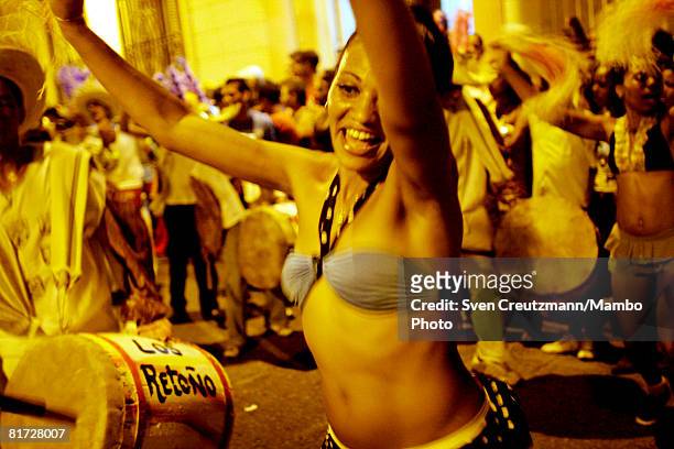Cuban girl dances as conga groups march through the streets during the Camaguey carnival June 24, 2008 in Camaguey, Cuba. The first day celebration...