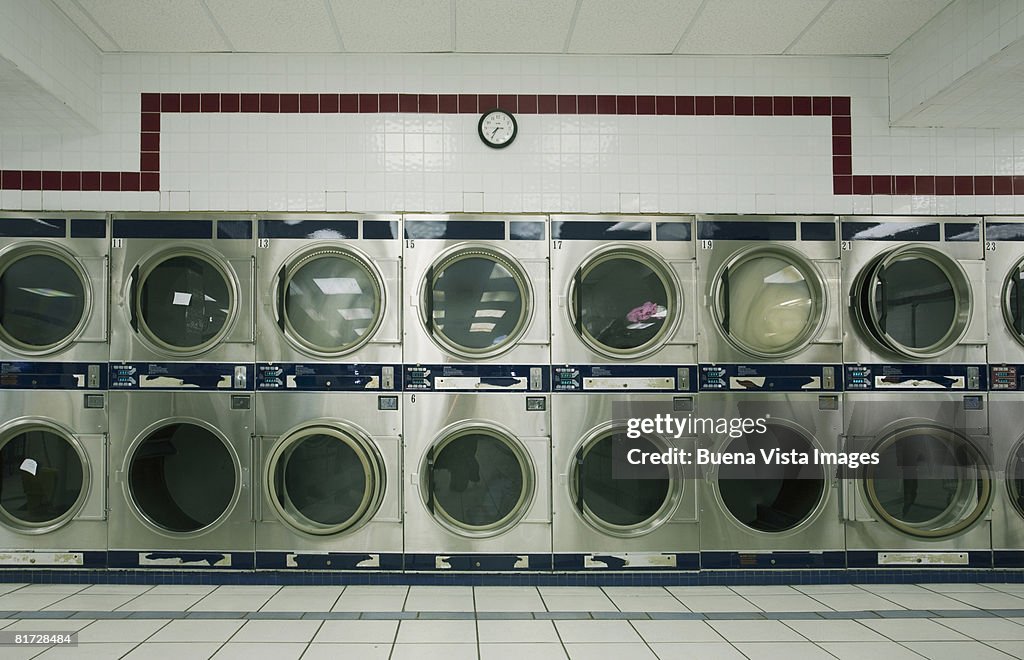 Line of dryers in laundrymat