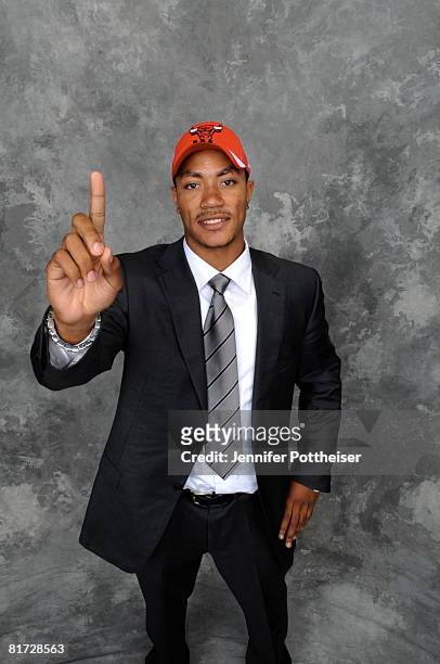 Derrick Rose selected number one overall by the Chicago Bulls poses for a portrait backstage during the 2008 NBA Draft on June 26, 2008 at the WaMu...