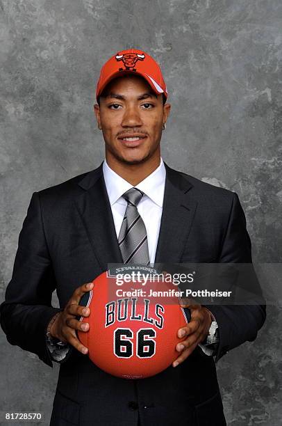 Derrick Rose selected number one overall by the Chicago Bulls poses for a portrait backstage during the 2008 NBA Draft on June 26, 2008 at the WaMu...