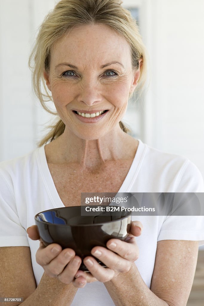 Portrait of mature woman with tea