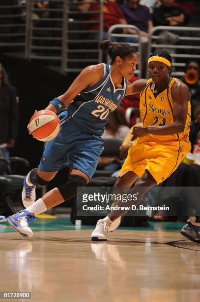 Marie Ferdinand-Harris of the Los Angeles Sparks guards a drive from Alana Beard of the Washington Mystics on June 26, 2008 at Staples Center in Los...