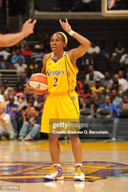 Temeka Johnson of the Los Angeles Sparks motions a play during the game against the Washington Mystics on June 26, 2008 at Staples Center in Los...