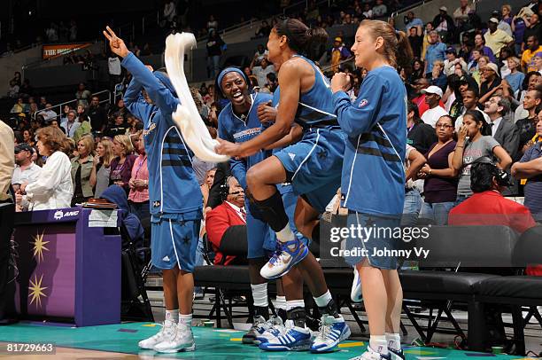 The Washington Mystics players celebrate from the bench during the fourth quarter of their game against the Los Angeles Sparks on June 26, 2008 at...