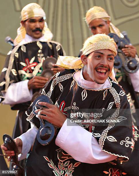 Gnaoua musicians perform during the opening of the 11th Gnaoua Festival and Musics of the World of Essaouira on June 26, 2008. The festival, taking...