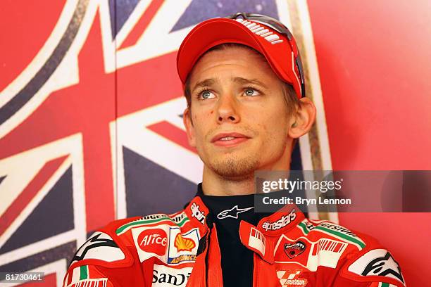 World Champion Casey Stoner of Australia and the Ducati Marlboro Team watches the timing monitors during practice prior to qualifying for the Dutch...