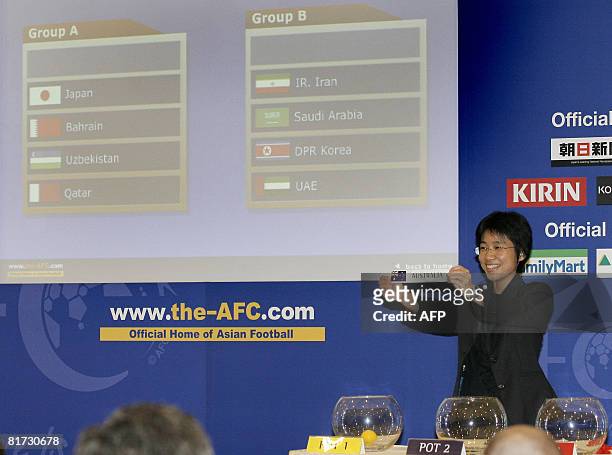 Asian Football Confederation Director of Competitions, Michelle Chai smiles during the 2010 FIFA World Cup Asian Qualifiers Round 4 draw at the Asian...
