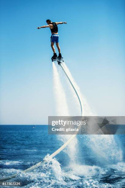 flyboarding. - hoverboard flying stockfoto's en -beelden