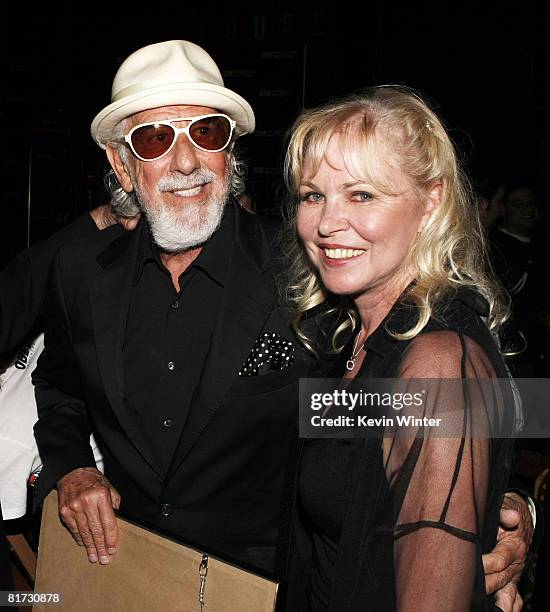 Producer/club owner Lou Adler and singer Michelle Phillips pose at the Sunset Strip Music Festival's opening night ceremony at the House of Blues on...