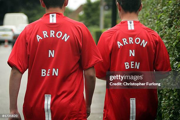 Young mourners wear Manchester United football shirts bearing the names of brothers Arron Peak, ten years old and Ben Peak, eight years old, who were...