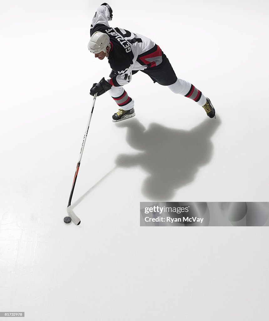 Ice hockey player in possession of puck