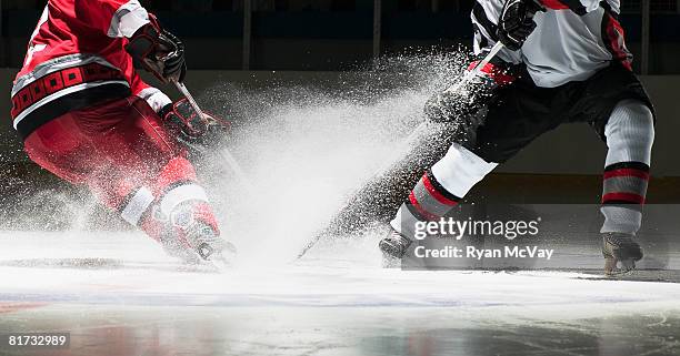 ice hockey players facing off - mens ice hockey fotografías e imágenes de stock