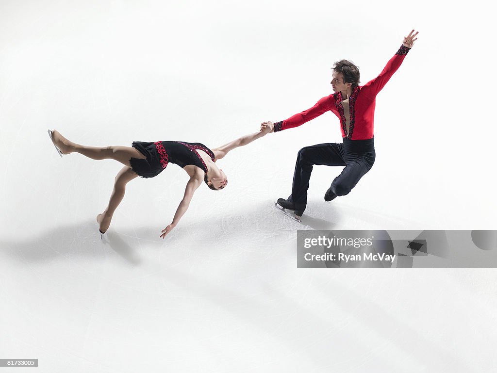 Figure skating pair performing a death spiral