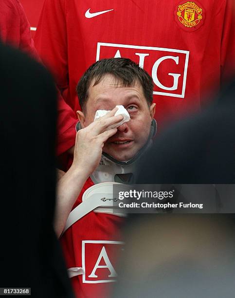 Philip Peak follows the coffin of his sons Arron, 10 and Ben, into Our Lady of Lourdes Church on June 27 in Partington, England. Ben and Arron from...