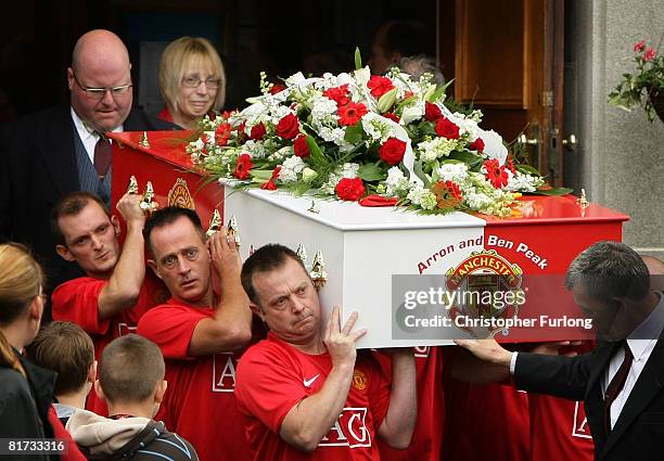 Amanda Peak follows the coffin of her sons Arron, 10 and Ben, from Our Lady of Lourdes Church on June 27 in Partington, England. Ben and Arron from...