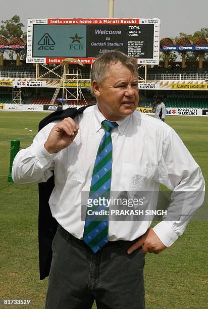 This picture taken on June 26 2008 shows International Cricket Council match referee for the ongoing Asia Cup, Mike Procter walking back to the...