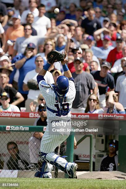 Catcher Geovany Soto of the Chicago Cubs moves to catch the pop-up during the game against the Chicago White Sox on June 20, 2008 at Wrigley Field in...