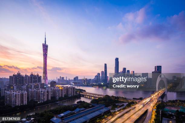 urban night with evening glow - canton tower stock pictures, royalty-free photos & images