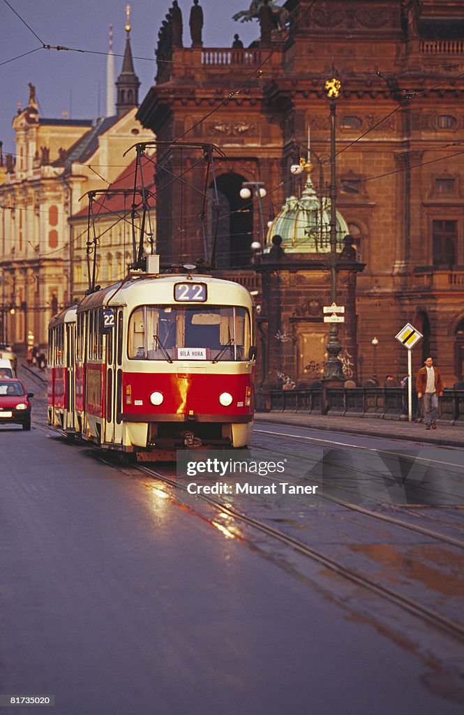 Tram on Most Legii Bridge.  National Theater on the right.  Prague, Czech Republic