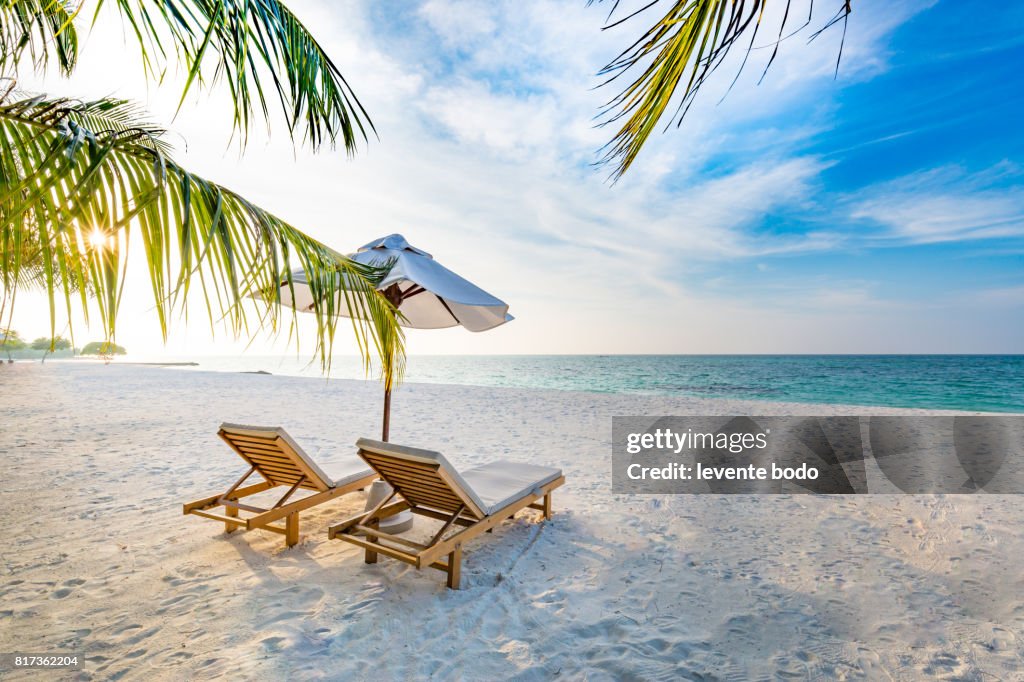 Amazing beach sunset. Beach scene with relaxing mood.