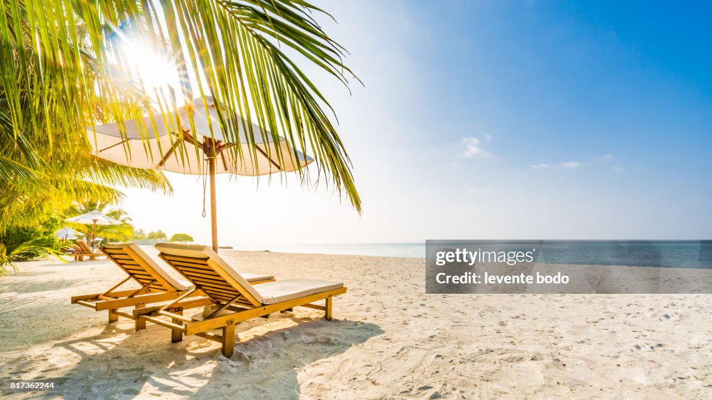 Amazing beach sunset. Beach scene with relaxing mood.