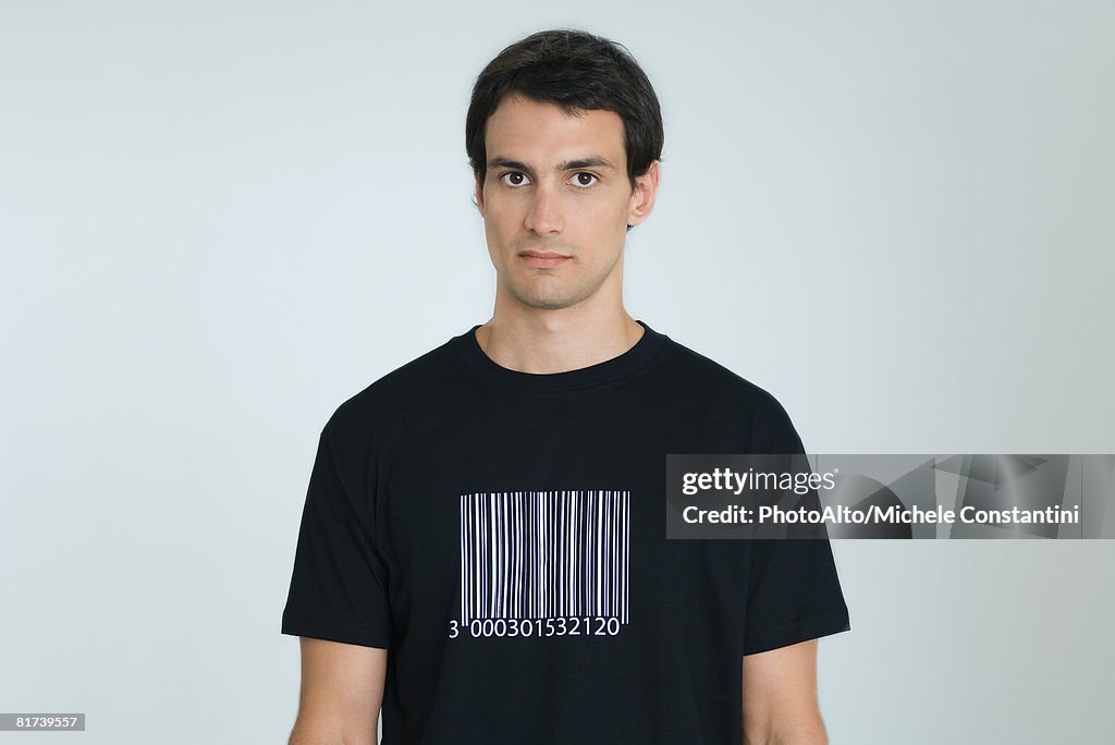 Man wearing tee-shirt with bar code, portrait