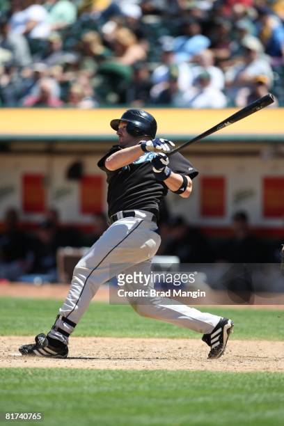 Kevin Mench of the Toronto Blue Jays hits during the game against the Oakland Athletics at the McAfee Coliseum in Oakland, California on May 29,...