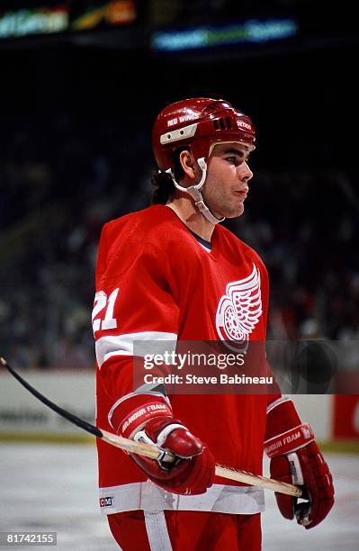 Adam Oates of the Detroit Red Wings skates in game against the Boston Bruins at the Boston Garden in Boston .