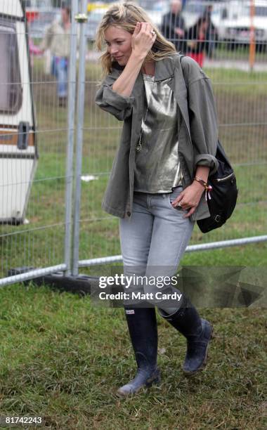 Kate Moss walks to see The Kills play on the John Peel Stage at the Glastonbury Festival as KT Tunstall performs on June 27 2008 in Glastonbury,...