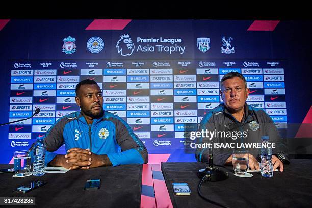 Leicester City Football Club manager Craig Shakespeare and player Wes Morgan attend a press conference in Hong Kong on July 18 ahead of the 2017...