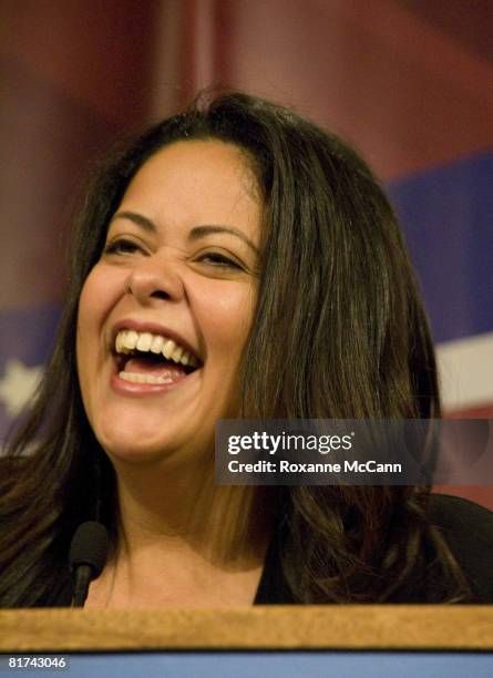 Maya Soetoro-Ng, half-sister of Barack Obama, and Hawaii resident, reacts to the cheers of the crowd in support of Barack Obama as Democratic...