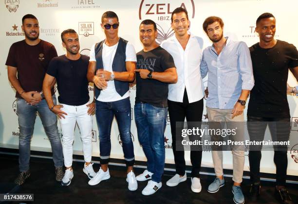 Real madrid fooball player Cristiano Ronaldo , his brother Hugo Aveiro and friends attend the opening of the mediterranean-japanese restaurant Zela,...