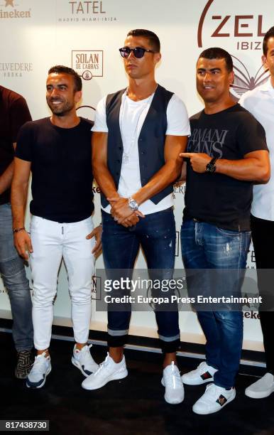 Real madrid fooball player Cristiano Ronaldo and his brother Hugo Aveiro attend the opening of the mediterranean-japanese restaurant Zela, belonging...