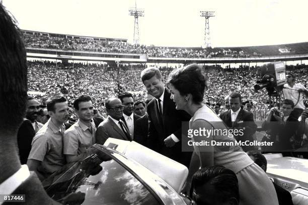 Jacqueline Kennedy and her husband John F. Kennedy attend the Orange Bowl in Miami, FL January 29, 1962 where JFK addressed the 2506th Brigade after...