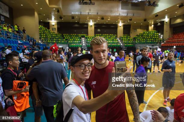 Liverpool FC's Loris Karius takes selfie with a Hong Kong fans during the Premier League Asia Trophy Skills Session at Macpherson Stadium on July 18,...
