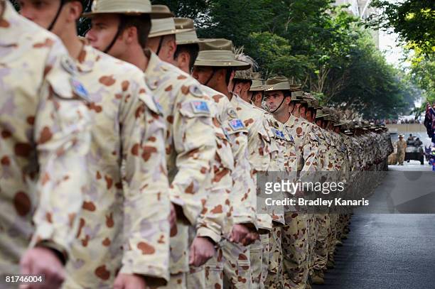 Australian soldiers who served in Iraq over the last five years march through the streets of Brisbane at the Queensland Welcome Home Parade on June...