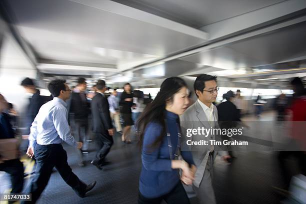 Busy elevated walkways in Hong Kong Financial District, Connaught Road, Central Hong Kong Island, China