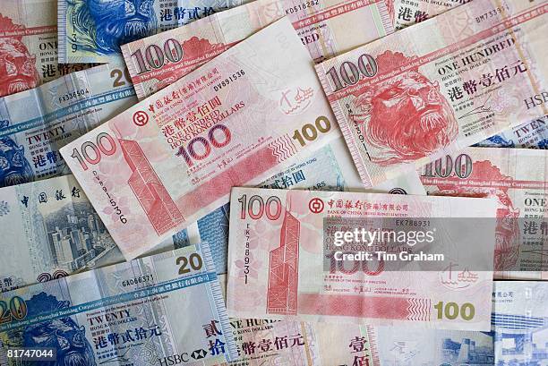 Hong Kong Dollar bills feature image of the Bank of China Building, Hong Kong, China