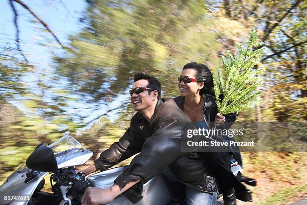 couple on motorcycle - steve prezant stock pictures, royalty-free photos & images